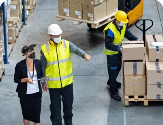 warehouse workers loading and unloading goods