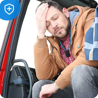 Fahrer saß in einem Lastwagen und fühlte sich krank und hatte ein H8 um den Hals, um um Hilfe zu rufen