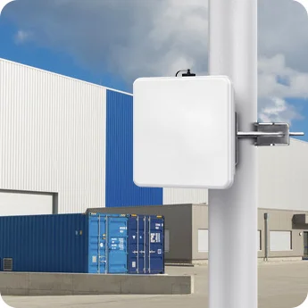LW003-B Pro mounted on a pole in an industrial yard to monitor shipping containers and outdoor assets