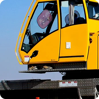 LW015 smart label attached to construction equipment cab for asset tracking.