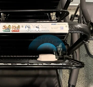 LW001-BG Pro tracker attached to a wheelchair cart.
