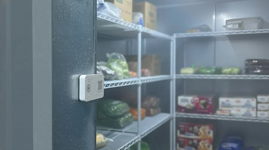 S05T BLE temperature logger installed in a cold storage room for real-time temperature tracking
