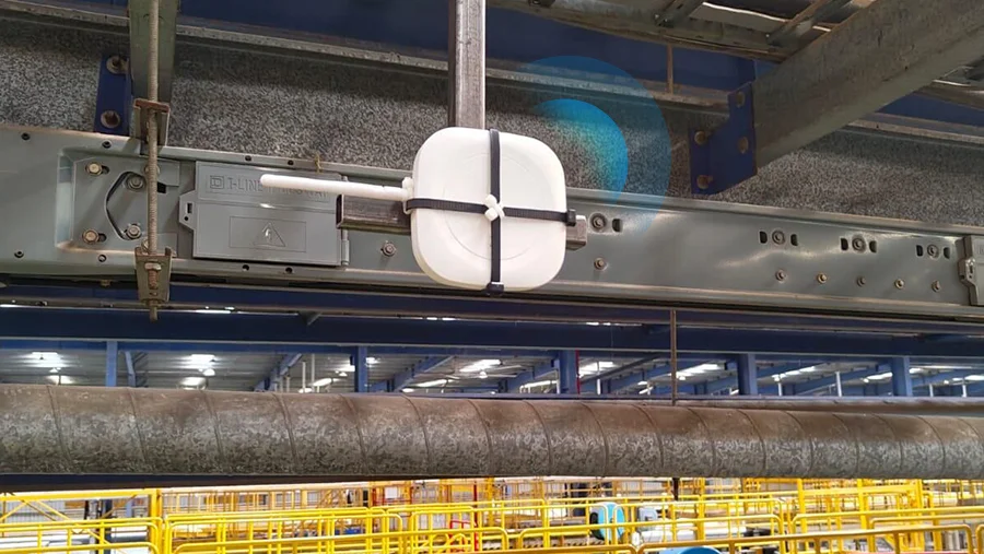 MKGW3 indoor BLE PoE gateway installed on factory overhead structure to capture beacon signals